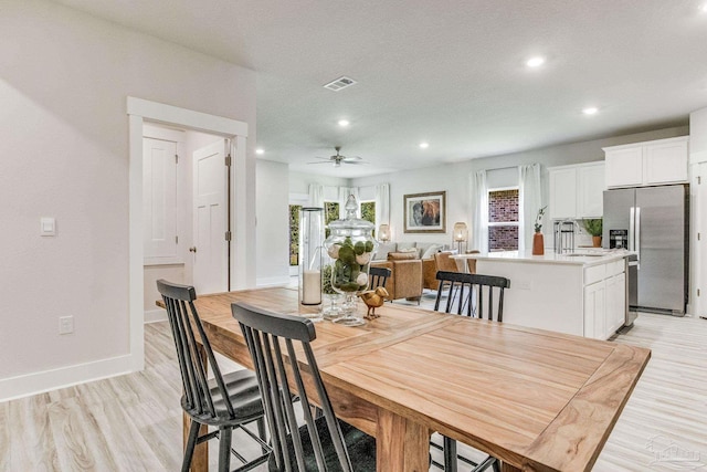 9777 Windy Hill Rd, Pensacola, FL 32526 - dining space featuring ceiling fan, light wood-style flooring, and recessed lighting