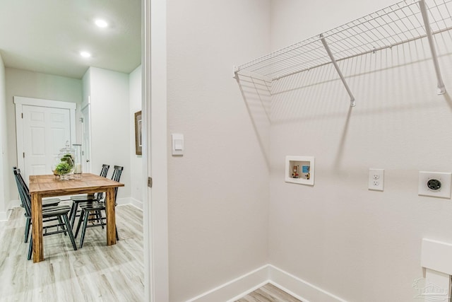 9777 Windy Hill Rd, Pensacola, FL 32526 - laundry room featuring electric dryer hookup, hookup for a washing machine, light wood-style flooring, and recessed lighting