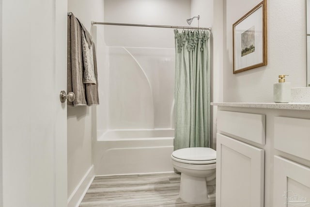 9777 Windy Hill Rd, Pensacola, FL 32526 - full bath with vanity, shower / tub combo, and wood finished floors