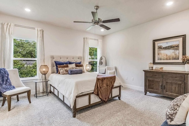 9777 Windy Hill Rd, Pensacola, FL 32526 - bedroom featuring multiple windows, light carpet, recessed lighting, and ceiling fan
