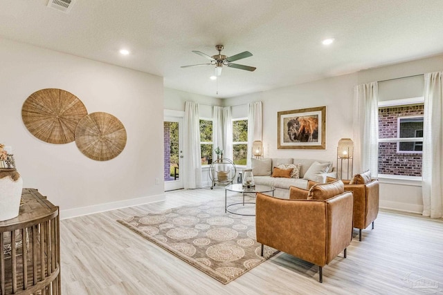 9777 Windy Hill Rd, Pensacola, FL 32526 - living area featuring light wood finished floors, a ceiling fan, recessed lighting, and a textured ceiling