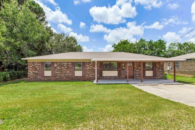 7125 Ben Sasser Dr, Pensacola, FL 32526 - ranch-style home featuring a front yard, brick siding, and a porch