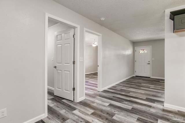 7125 Ben Sasser Dr, Pensacola, FL 32526 - entryway featuring a textured ceiling and wood finished floors