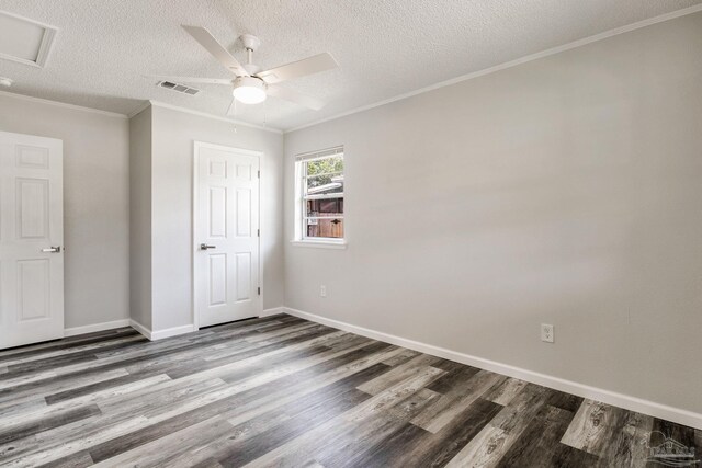 7125 Ben Sasser Dr, Pensacola, FL 32526 - unfurnished bedroom with wood finished floors, a textured ceiling, crown molding, and a ceiling fan