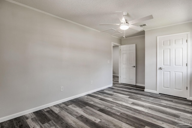 7125 Ben Sasser Dr, Pensacola, FL 32526 - unfurnished bedroom featuring dark wood-style floors, a textured ceiling, crown molding, and ceiling fan