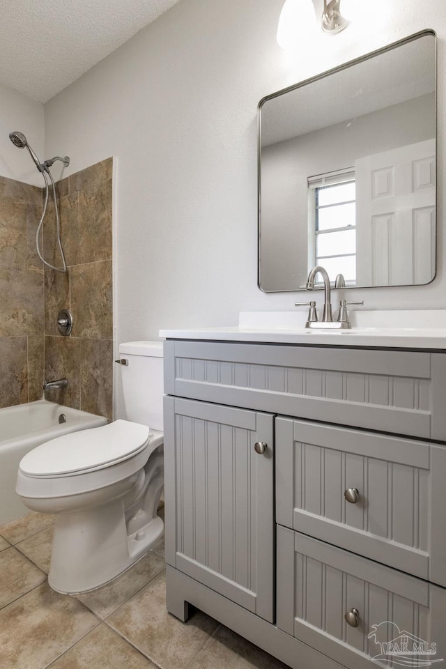 7125 Ben Sasser Dr, Pensacola, FL 32526 - full bathroom featuring vanity, shower / bathtub combination, tile patterned flooring, and a textured ceiling