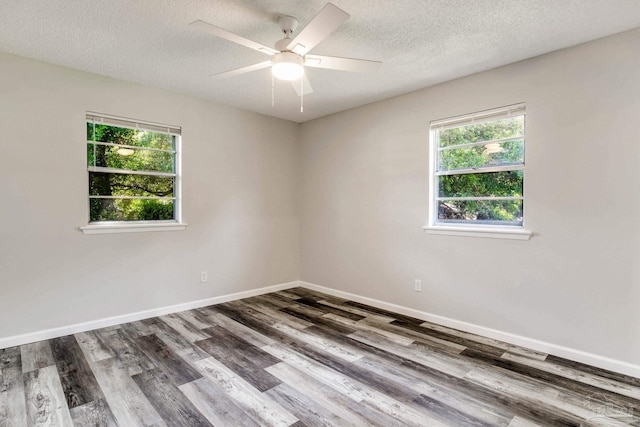 7125 Ben Sasser Dr, Pensacola, FL 32526 - spare room featuring wood finished floors, healthy amount of natural light, a textured ceiling, and ceiling fan