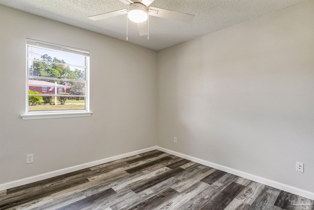 7125 Ben Sasser Dr, Pensacola, FL 32526 - unfurnished room with dark wood-type flooring, ceiling fan, and a textured ceiling