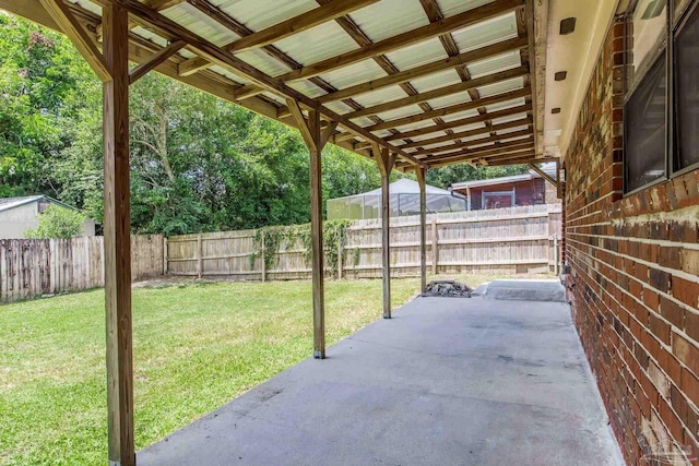 7125 Ben Sasser Dr, Pensacola, FL 32526 - fenced backyard featuring a patio area