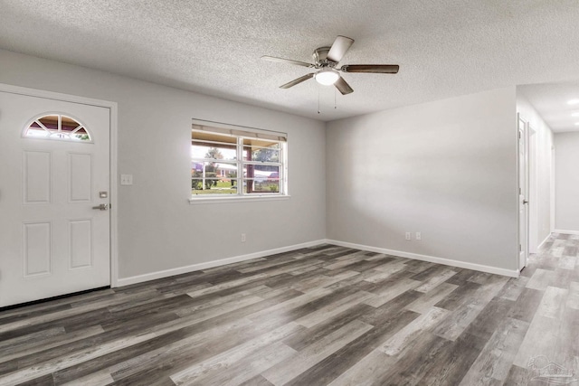 7125 Ben Sasser Dr, Pensacola, FL 32526 - entryway with a textured ceiling, wood finished floors, and a ceiling fan