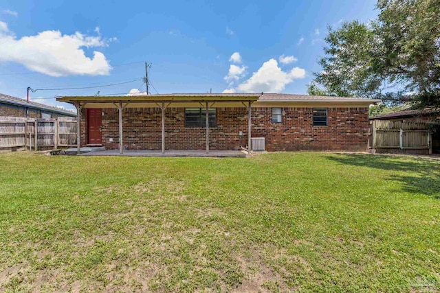 7125 Ben Sasser Dr, Pensacola, FL 32526 - rear view of property with brick siding