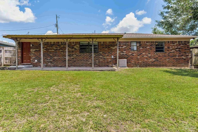 7125 Ben Sasser Dr, Pensacola, FL 32526 - rear view of property with brick siding
