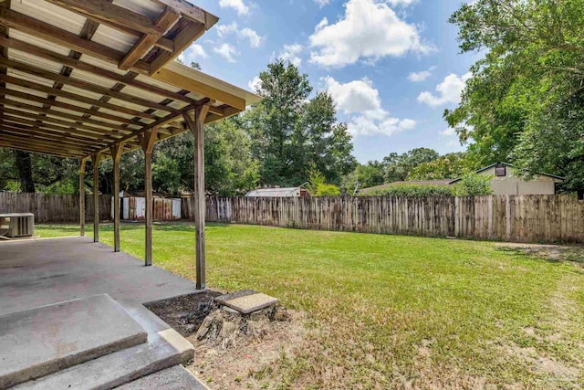 7125 Ben Sasser Dr, Pensacola, FL 32526 - fenced backyard featuring a patio area and a storage unit