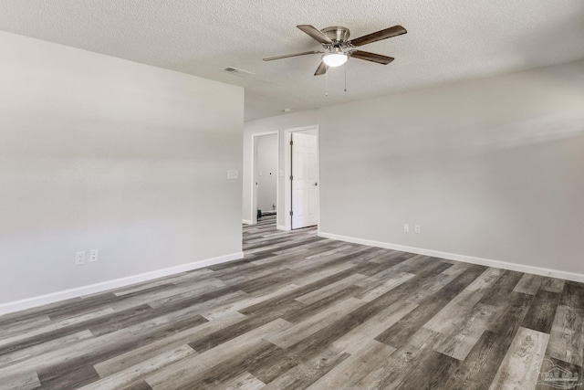 7125 Ben Sasser Dr, Pensacola, FL 32526 - unfurnished room featuring wood finished floors, a ceiling fan, and a textured ceiling