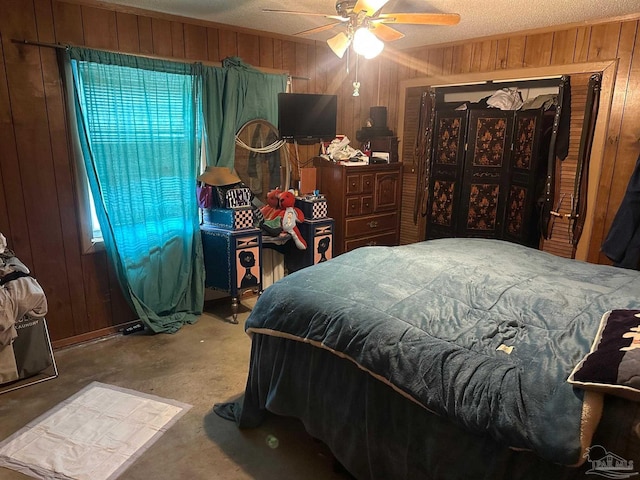 2939 Sundance Ln, Cantonment, FL 32533 - bedroom featuring wooden walls and ceiling fan