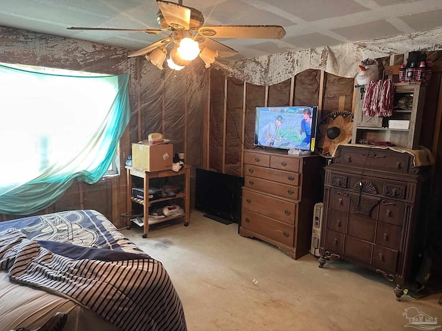 2939 Sundance Ln, Cantonment, FL 32533 - bedroom with a ceiling fan and concrete flooring
