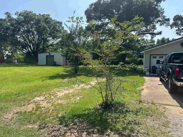2939 Sundance Ln, Cantonment, FL 32533 - view of grassy yard featuring an outdoor structure and an outbuilding