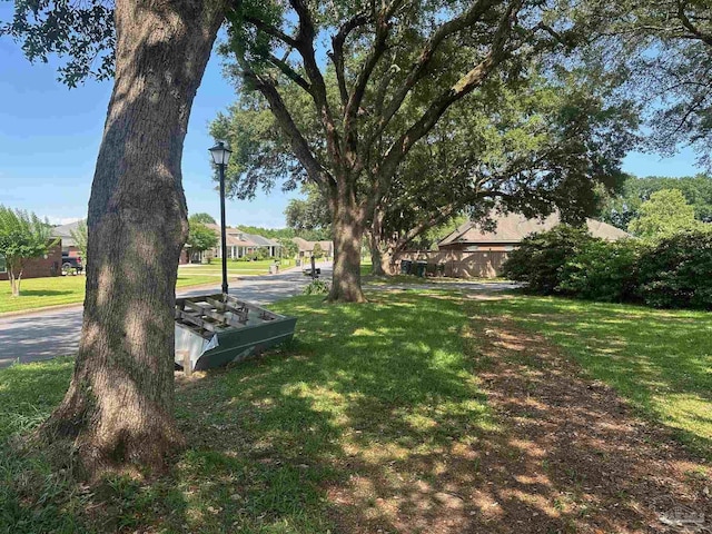 2939 Sundance Ln, Cantonment, FL 32533 - view of property's community with a lawn
