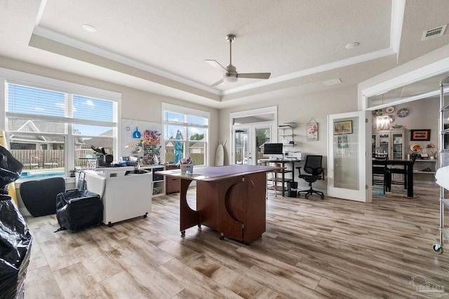 2420 Okatie Ln, Cantonment, FL 32533 - office area with a ceiling fan, french doors, light wood finished floors, a raised ceiling, and visible vents