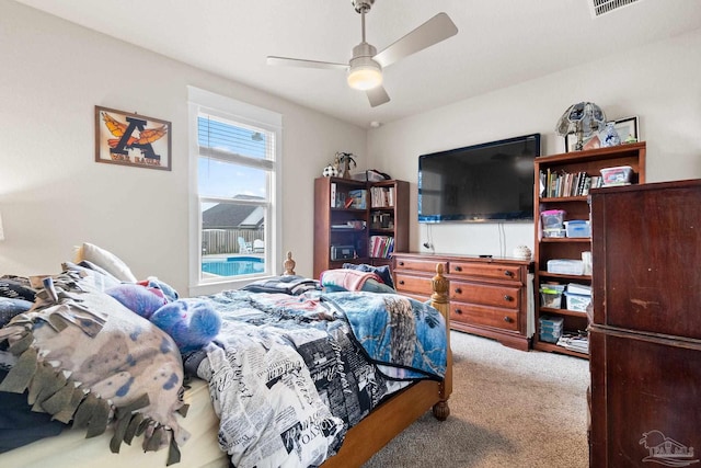 2420 Okatie Ln, Cantonment, FL 32533 - carpeted bedroom with a ceiling fan