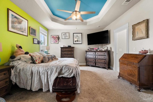 2420 Okatie Ln, Cantonment, FL 32533 - bedroom featuring visible vents, ceiling fan, carpet flooring, and a raised ceiling