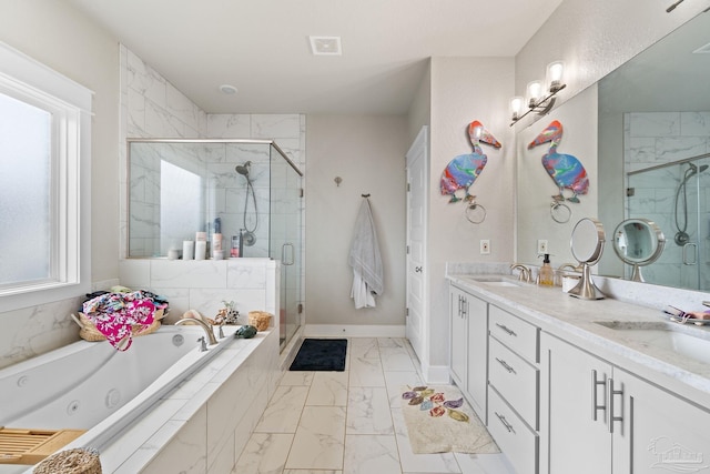 2420 Okatie Ln, Cantonment, FL 32533 - bathroom featuring a sink, a stall shower, marble finish floor, a whirlpool tub, and visible vents