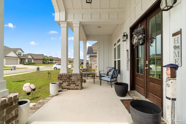 2420 Okatie Ln, Cantonment, FL 32533 - view of patio / terrace with a residential view, french doors, and a porch