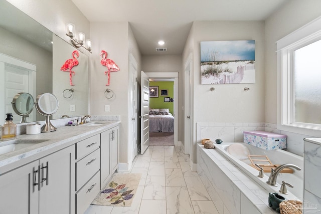 2420 Okatie Ln, Cantonment, FL 32533 - full bathroom featuring marble finish floor, a sink, visible vents, and plenty of natural light