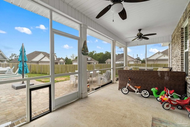 2420 Okatie Ln, Cantonment, FL 32533 - sunroom / solarium with a residential view and a ceiling fan