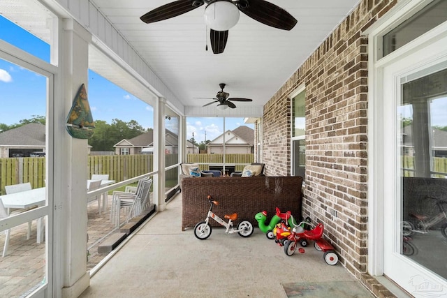 2420 Okatie Ln, Cantonment, FL 32533 - sunroom / solarium featuring ceiling fan and an outdoor hangout area