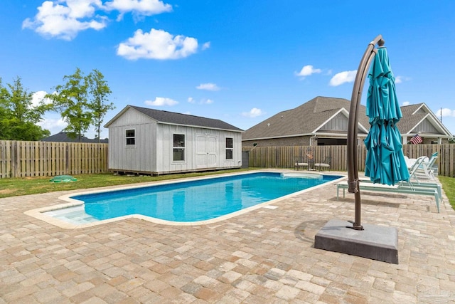 2420 Okatie Ln, Cantonment, FL 32533 - view of swimming pool featuring an outbuilding, a patio, and a fenced backyard