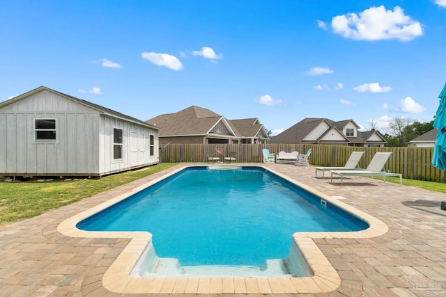 2420 Okatie Ln, Cantonment, FL 32533 - view of pool with a patio area, a fenced in pool, an outbuilding, and a fenced backyard