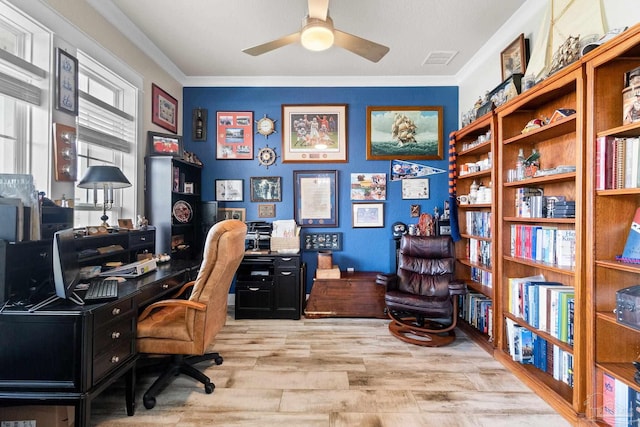 2420 Okatie Ln, Cantonment, FL 32533 - home office featuring light wood finished floors, a ceiling fan, visible vents, and ornamental molding