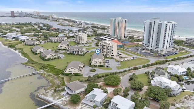 view of urban area featuring a nearby body of water