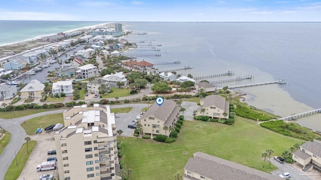 aerial view of property's location with a large body of water