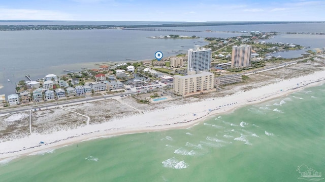 drone / aerial view of waterfront with a beach