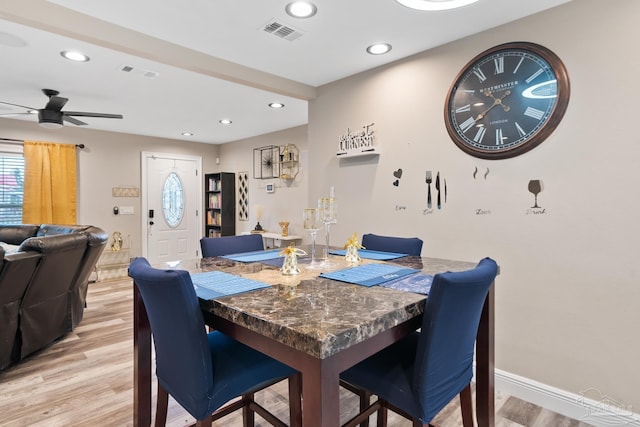 dining room with recessed lighting, visible vents, and light wood finished floors