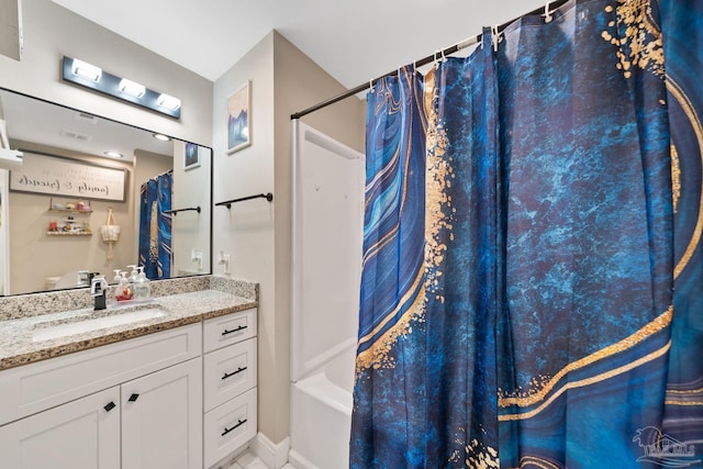 full bathroom featuring vanity and baseboards