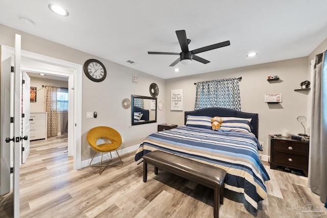 bedroom featuring recessed lighting, baseboards, and light wood-style floors