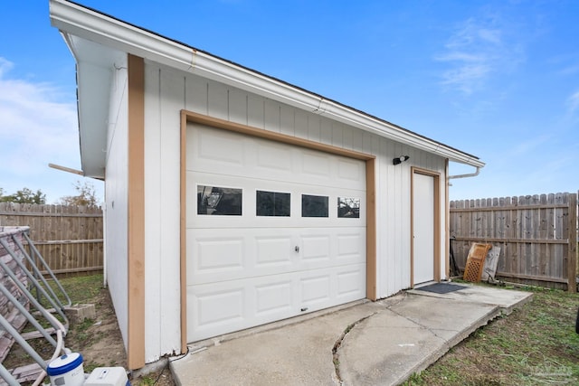 garage featuring fence