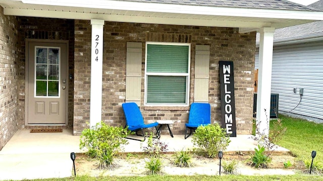 entrance to property with a porch