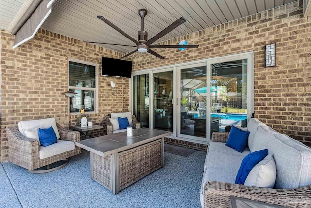 view of patio / terrace featuring ceiling fan