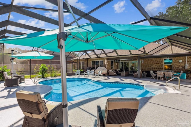 view of swimming pool with a patio and an outdoor hangout area