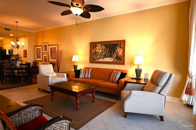 living room featuring light tile patterned floors, ceiling fan with notable chandelier, and ornamental molding