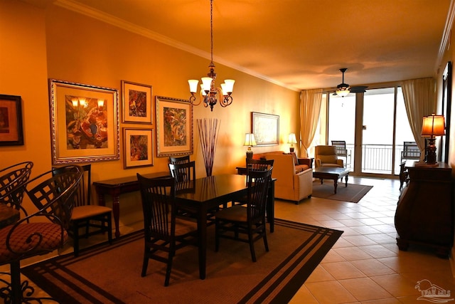 dining area featuring ceiling fan with notable chandelier, light tile patterned flooring, and ornamental molding