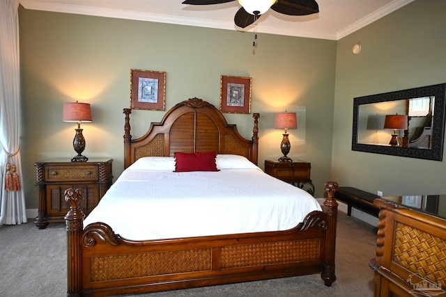 carpeted bedroom featuring ceiling fan and ornamental molding