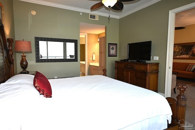 bedroom featuring ceiling fan, ensuite bathroom, and crown molding