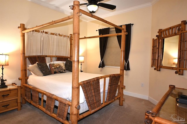 carpeted bedroom with ceiling fan and ornamental molding