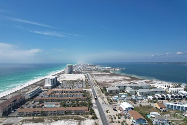 aerial view featuring a view of the beach and a water view