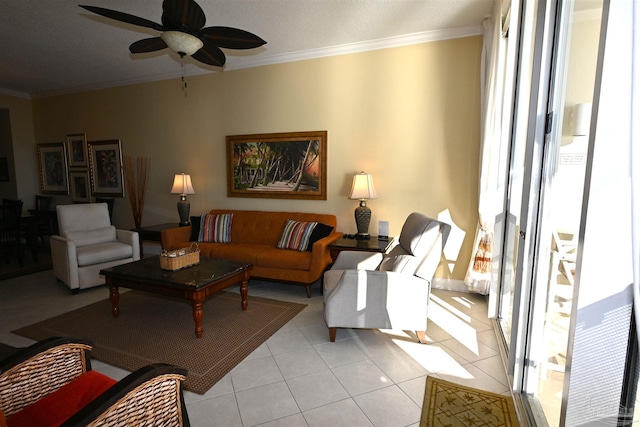 tiled living room featuring ceiling fan and crown molding